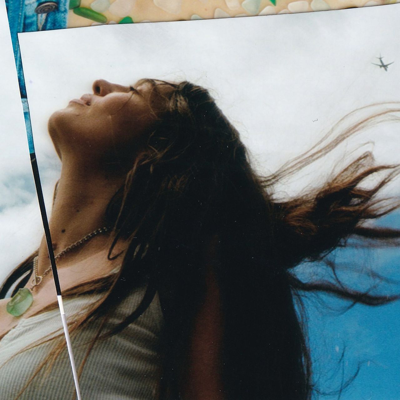 Single cover artwork for Kita Alexander's Back To Sydney featuring a side-profile photo of the artist looking up.